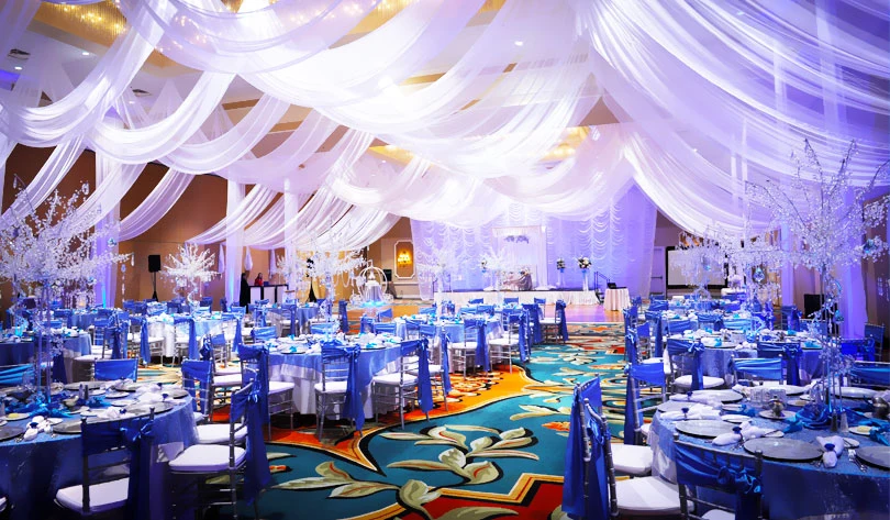 Beautifully decorated bed with flowers and romantic room setup by Mumtaz Decoration